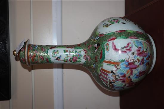 A large Chinese famille rose bottled vase and cover, mid 19th century (restored) height 46cm